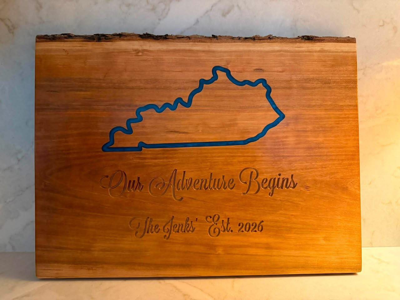 Kentucky live edge board with blue resin inlay